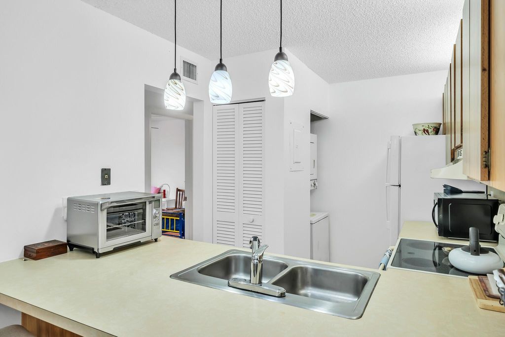 Photo of 3402 Gardens East Drive #14a, Palm Beach Gardens, FL 33410 (MLS # R11139313)