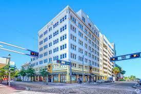 Beautifully renovated and furnished two room professional office, presenting a great investment opportunity in the middle of booming downtown West Palm Beach. Located in a historic building within walking distance to everything. Brand new A/C system installed in 2024. New upscale restaurant opening soon on first floor along with a national pizzaria in the corner unit. Parking available in several garages less than a block away. HOA is set to begin some renovations in 2025 and should be finished by the end of the year. Also available for lease or lease option.