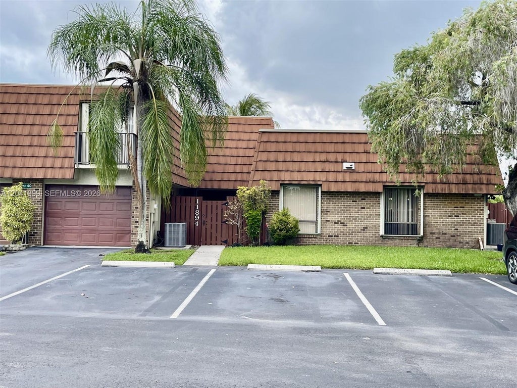 Photo of 11894 SW 12th Place #11894, Davie, FL 33325 (MLS # A12041999)