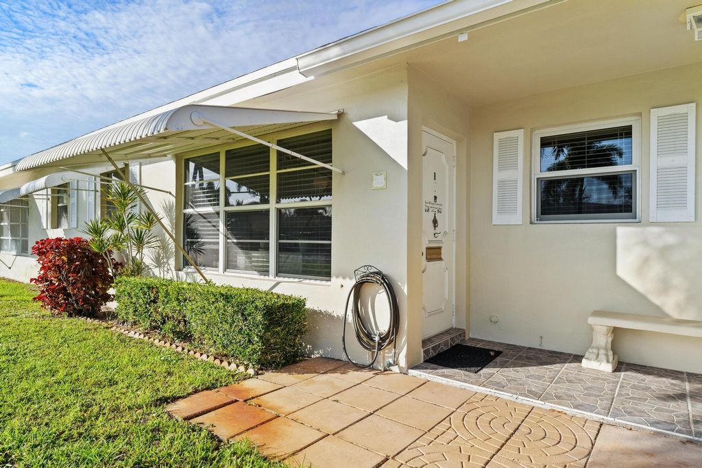 Photo of 201 Country Lane #B, Boynton Beach, FL 33435 (MLS # R11168200)