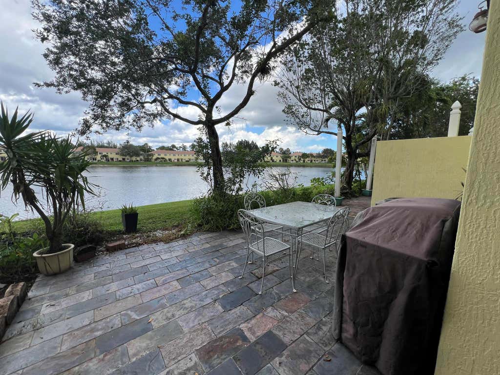 Photo of 1190 Imperial Lake Road, West Palm Beach, FL 33413 (MLS # R11142748)