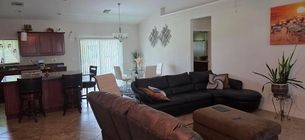 Photo of 5838 NW Gillespie Avenue, Port Saint Lucie, FL 34986 (MLS # R11139768)