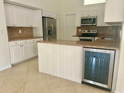 Tiny photo for 7045 GOLF POINTE Circle #7045, Tamarac, FL 33321 (MLS # B26090348)