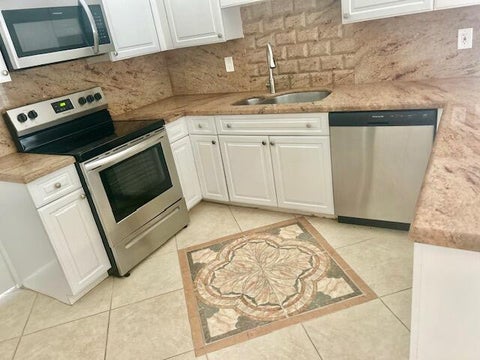 Tiny photo for 7045 GOLF POINTE Circle #7045, Tamarac, FL 33321 (MLS # B26090348)