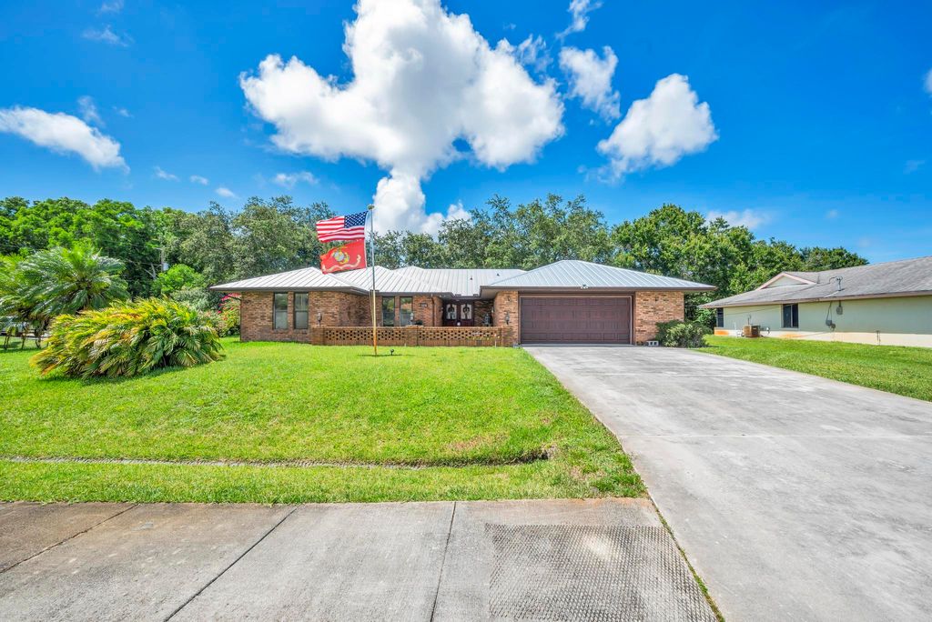 Photo of 5076 NW Manville Drive, Port Saint Lucie, FL 34983 (MLS # R10814322)