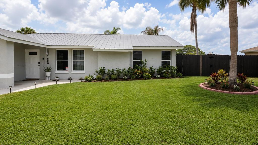Photo of 2068 SE Triumph Road, Port Saint Lucie, FL 34952 (MLS # B26030111)
