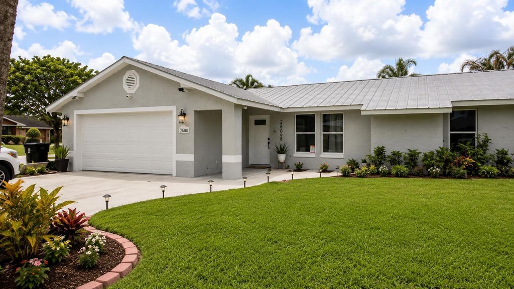 Photo of 2068 SE Triumph Road, Port Saint Lucie, FL 34952 (MLS # B26030111)