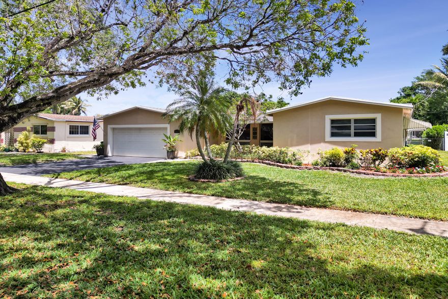 A large lot, waterfront, great living space, and Cooper City under $700K? That usually sounds like the start of a wish list, not an actual listing, yet here we are.  This home delivers the kind of backyard people move to the suburbs for: oversized, peaceful, waterfront, and ready for fishing, a small paddle boat, weekend BBQs, or watching the kids run around while you pretend you're relaxing. Inside, you'll find 3 bedrooms, an office, a studio/flex space, generous common areas, and beautiful natural light.  If your goal is to be settled in Cooper City before the next school year, this one deserves a serious look. Space, setting, and value all in one package, and off course all with the A-Rated schools that Cooper City's known for!