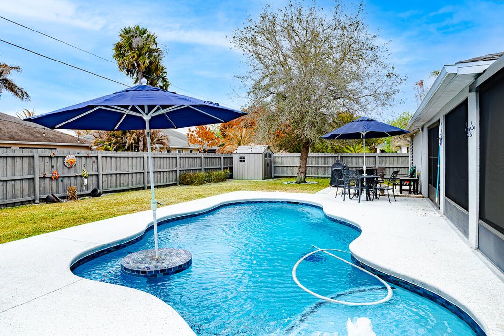 Photo of 4582 SW Uleta Street, Port Saint Lucie, FL 34953 (MLS # R11164851)