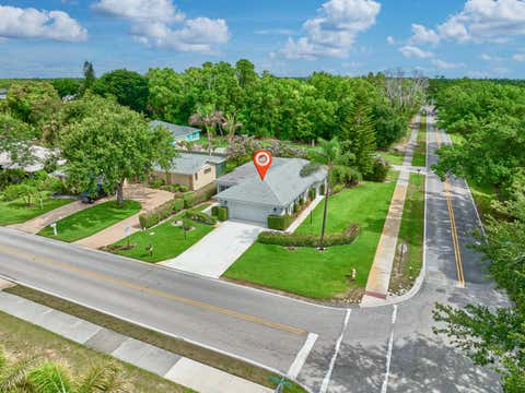 Photo of 9901 SE Little Club Way N, Tequesta, FL 33469 (MLS # B26038497)