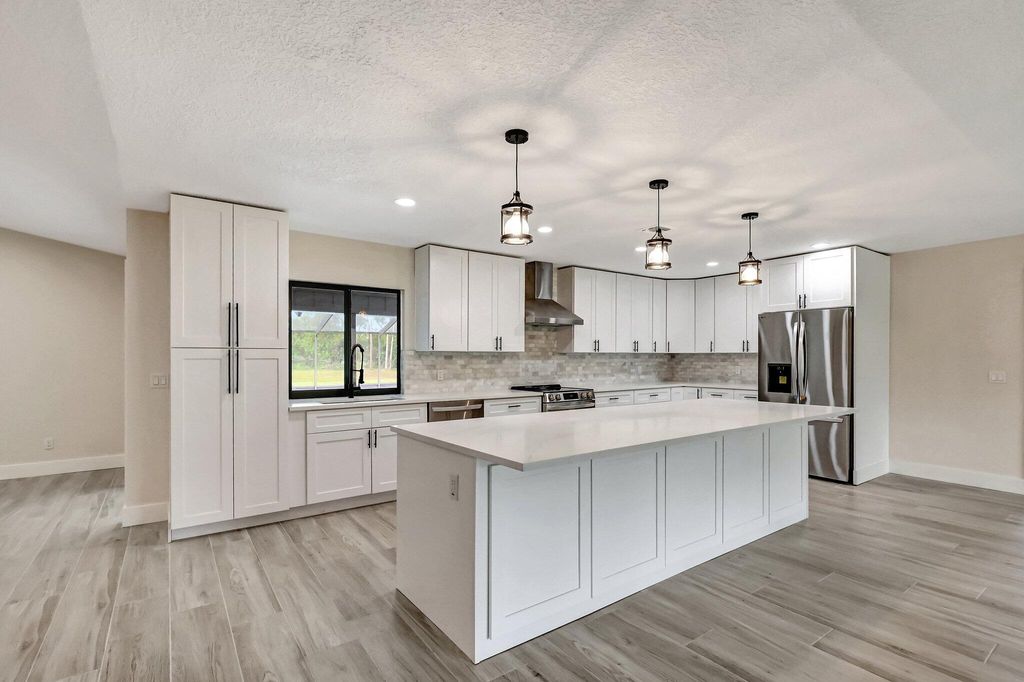 Photo of 2195 SW Ranch Trail, Stuart, FL 34997 (MLS # R11005189)