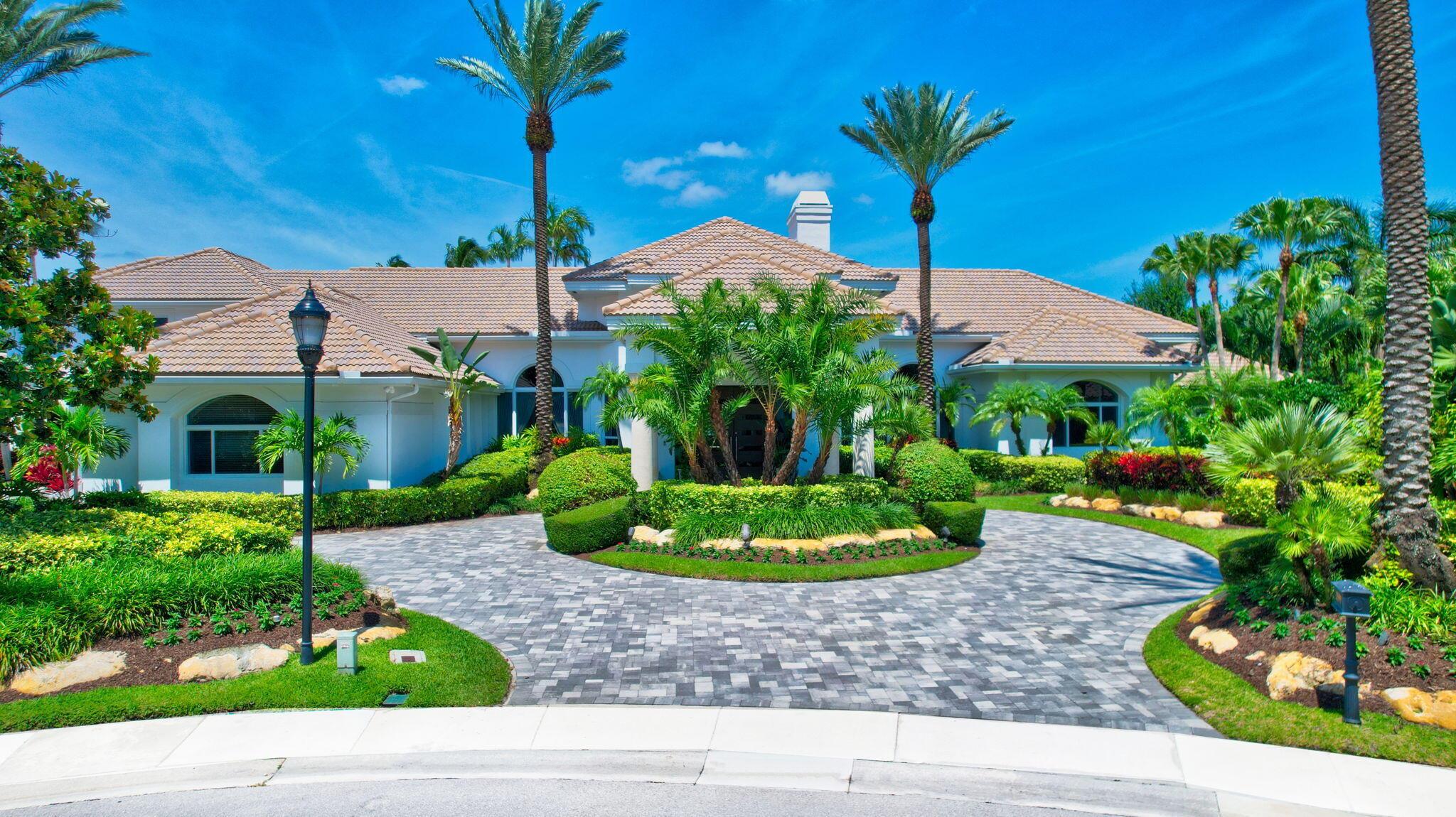 MAGNIFICENT DOUBLE LOT ESTATE SITUATED ON 284' OF PRISTINE WATERFRONT IN GRAND OAKS AT BROKEN SOUND COUNTRY CLUB! 8,328 SF OF PURE LUXURY NESTLED ON A CUL-DE-SAC ON .88 ACRE! 6 EN-SUITE BEDROOMS + OFFICE, 7.2 BATHS & FLOOR TO CEILING IMPACT WINDOWS WITH PANORAMIC VIEWS OF THE GOLF FAIRWAYS & LAKES! PALATIAL PRIMARY BEDROOM SUITE WITH PRIVATE SITTING AREA, A SPA INSPIRED BATHROOM & HIS/HER CLOSETS! UPSTAIRS PRIVATE RETREAT WITH FULLY EQUIPPED KITCHEN, LIVING ROOM & EN-SUITE BEDROOM! GUEST HOUSE WITH COVERED BREEZEWAY TO THE MAIN HOUSE! GOURMET CHEF'S KITCHEN WITH CUSTOM CABINETS, QUARTZ COUNTER TOPS, DOUBLE OVENS & WINE COOLER! EXPANSIVE PATIO WITH OUTDOOR DINING, RESORT STYLE POOL WITH JACUZZI, WATER SPOUTS AND SWIM UP POOL BAR WITH BBQ, TROPICAL FOUNTAIN AND INTIMATE SEATING AREAS!