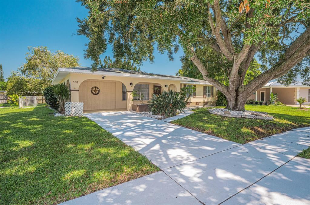 Photo of 161 NE Tunison Avenue, Port St Lucie, FL 34983 (MLS # R10834323)