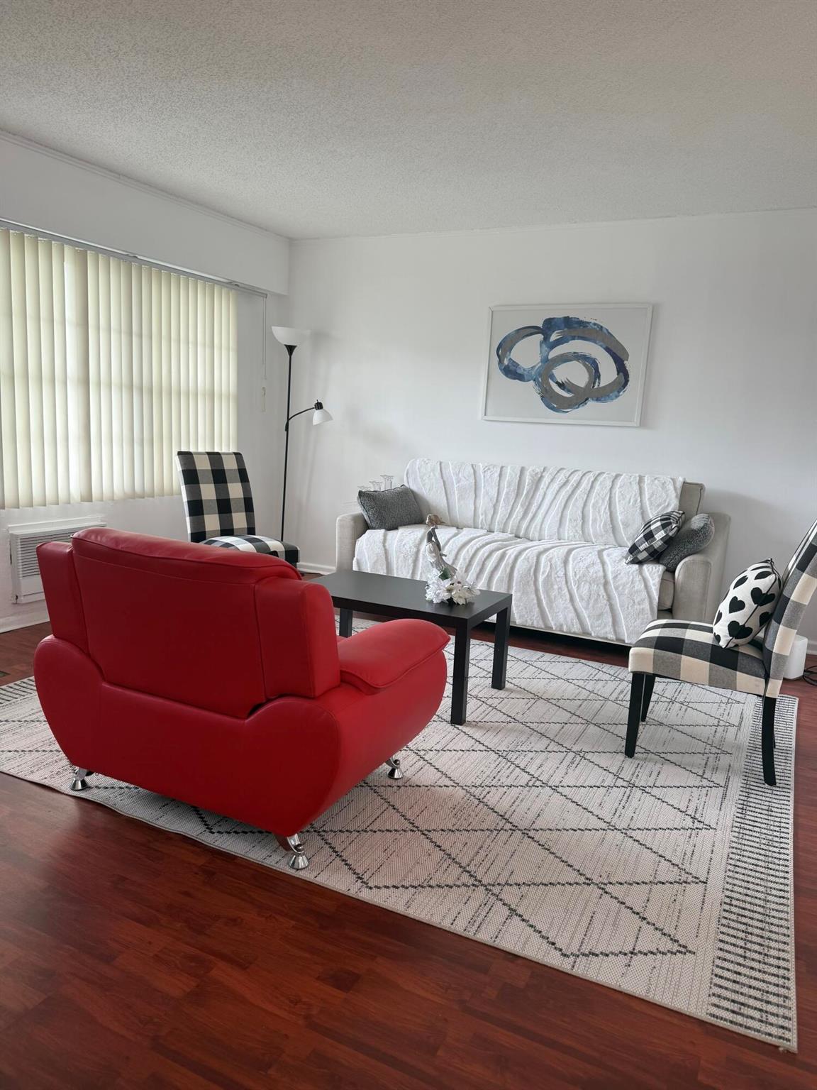 SHORT WALK TO HOUSES OF WORSHIP AND CLUBHOUSE. Move right in to this freshly painted 1 very large bedroom 1.5 bathroom condo. Built in work area. AC wall unit in bedroom is new. Porcelain floors in the kitchen with Porcelain counter tops. Laminate flooring in living room and dining room, carpet in the bedroom. Sliding doors to open porch from bedroom. Close to elevator. A MUST SEE
