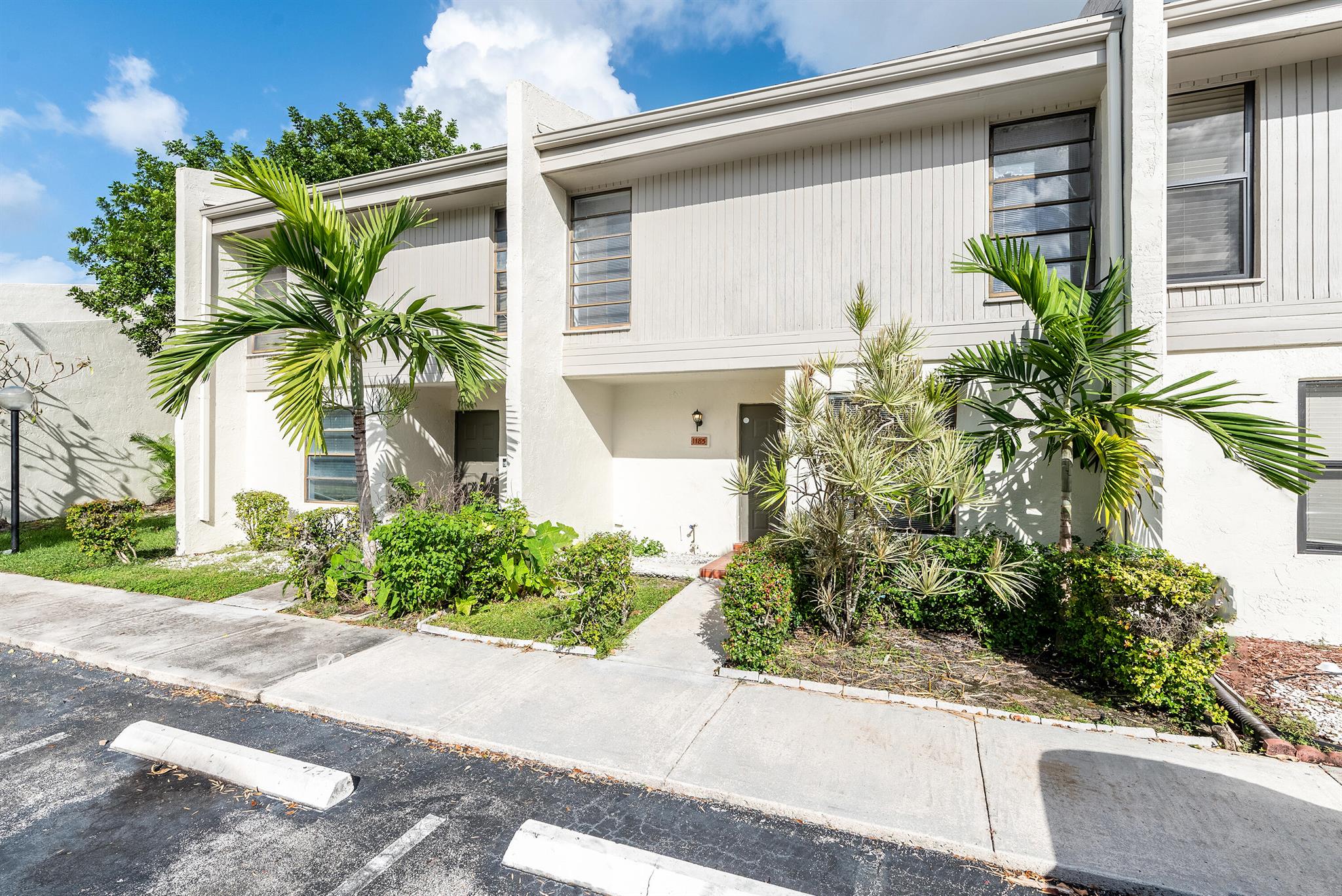Stunning 3-bedroom, 2.5-bath lakefront home in WestView 8 of Pembroke Pines! This beautifully updated property features a spacious main-level living area and an open patio with breathtaking lake views. The modern kitchen boasts granite countertops, stainless steel appliances, and new flooring throughout the home. All bathrooms have been tastefully updated with granite countertops and tile showers. Freshly painted and equipped with a brand-new AC unit. Located in an all-ages community where the HOA maintains the roof for added peace of mind. Enjoy serene lakeside living in this vibrant community!