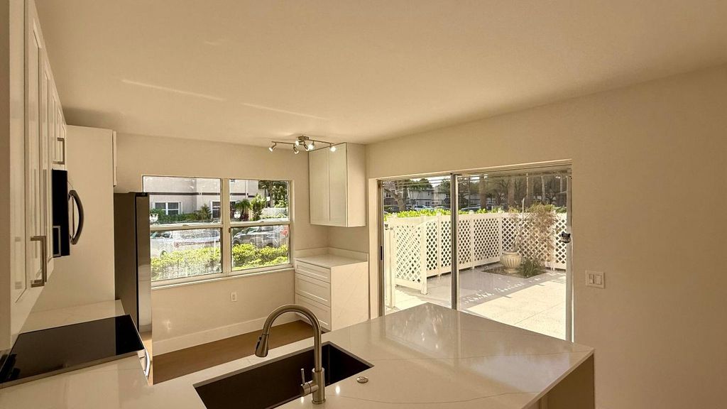 Photo of 19 Amherst Court #C, Royal Palm Beach, FL 33411 (MLS # R11156410)