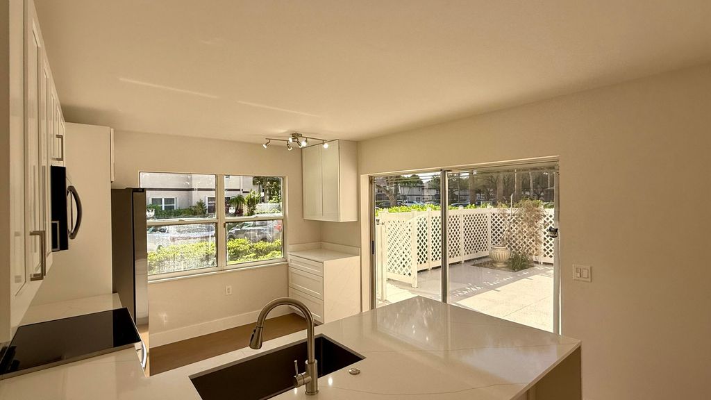 Photo of 19 Amherst Court #C, Royal Palm Beach, FL 33411 (MLS # R11156410)