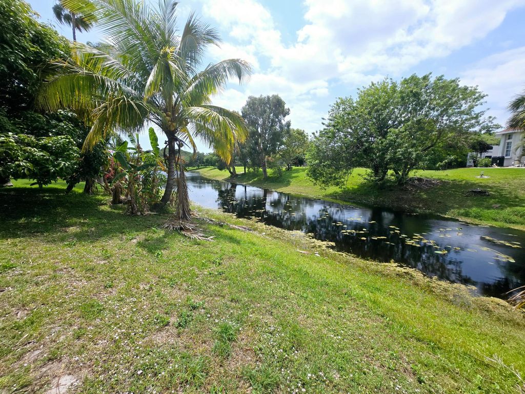 Photo of 2944 NE Loquat Lane, Jensen Beach, FL 34957 (MLS # R11082170)