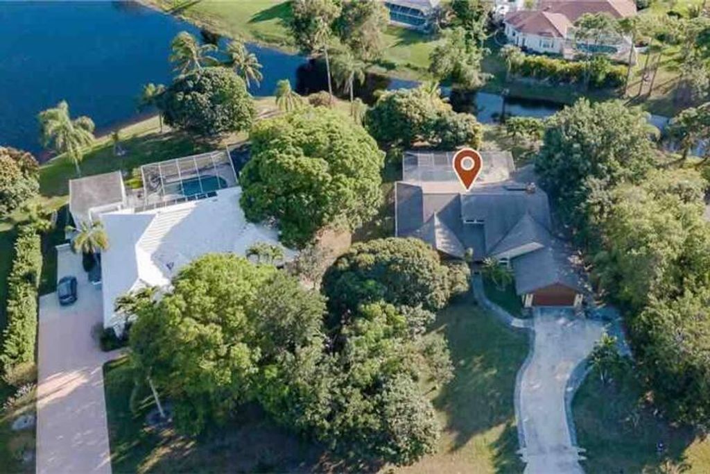 Photo of 2944 NE Loquat Lane, Jensen Beach, FL 34957 (MLS # R11082170)