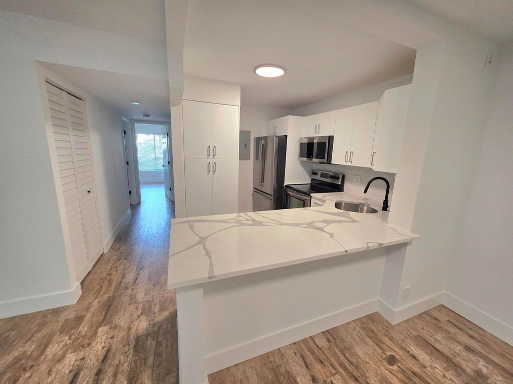 Photo of 209 Foxtail Drive #G1, Greenacres, FL 33415 (MLS # B26015005)