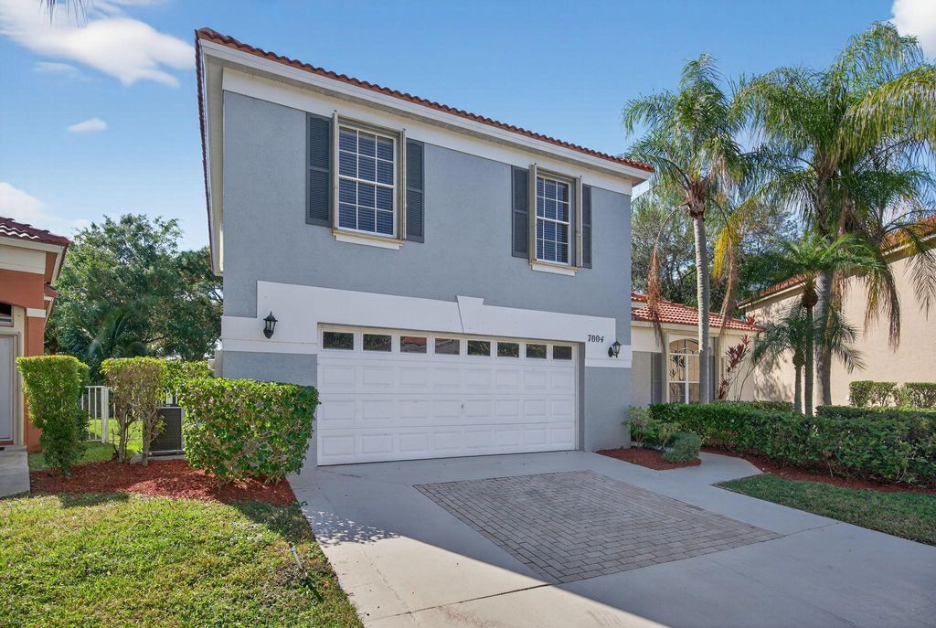 Photo of 7004 Galleon Cove Circle, Riviera Beach, FL 33418 (MLS # R11143847)