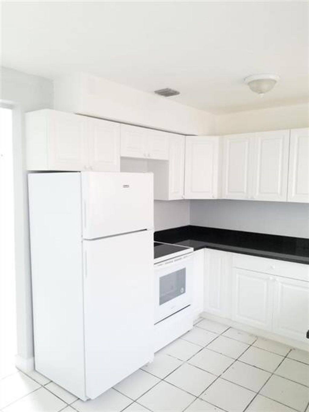 Photo of 1205 NW 19th Avenue, Fort Lauderdale, FL 33311 (MLS # B26013156)