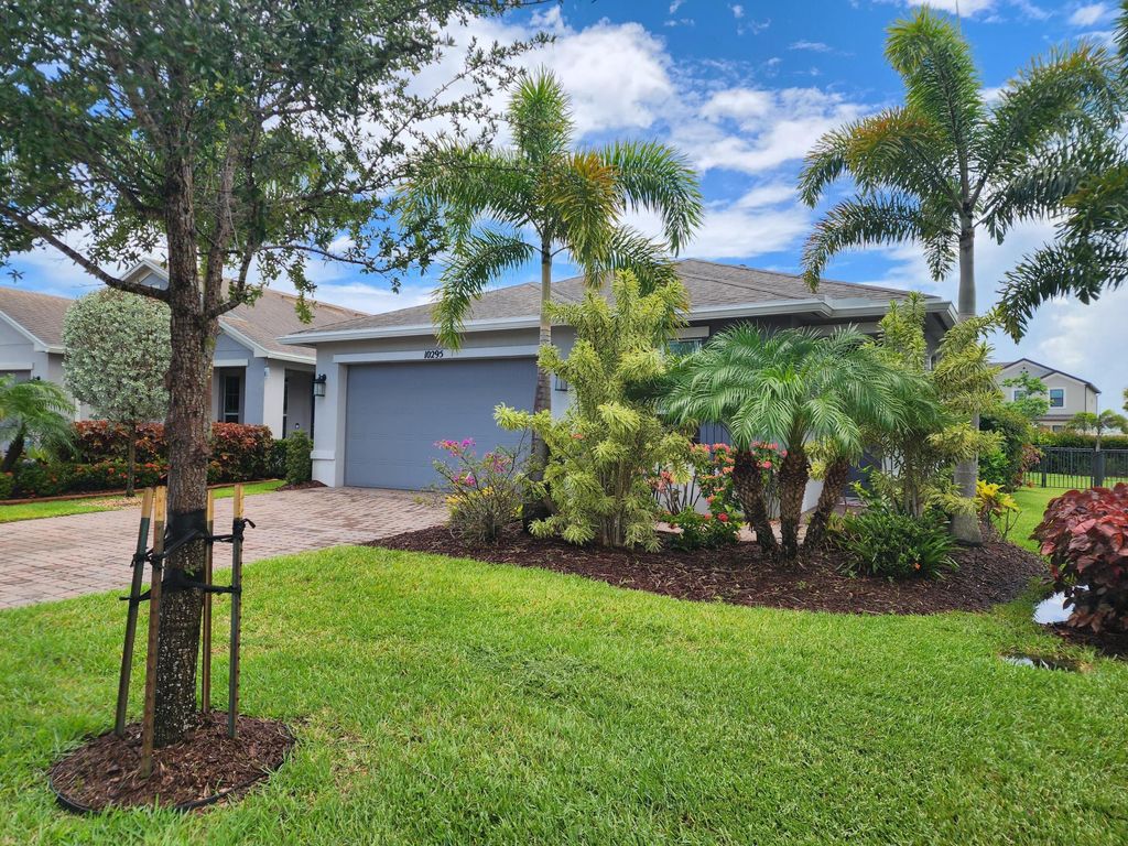 Photo of 10295 SW Indian Lilac Trail, Port Saint Lucie, FL 34987 (MLS # R11159050)