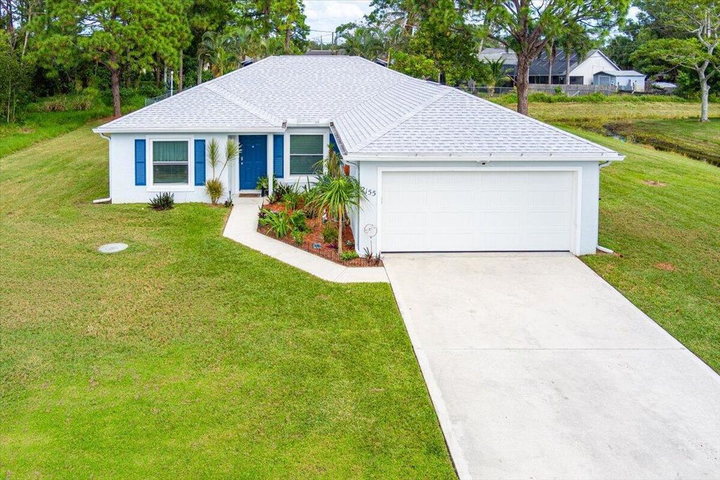 Photo of 2155 SE Broward Terrace, Port Saint Lucie, FL 34952 (MLS # R11032746)