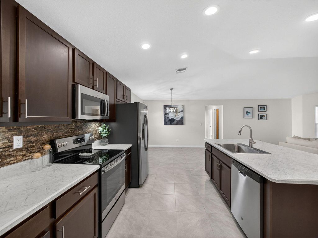 Photo of 1633 SW Diamond Street, Port Saint Lucie, FL 34953 (MLS # R11147503)