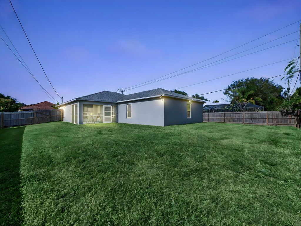 Photo of 1633 SW Diamond Street, Port Saint Lucie, FL 34953 (MLS # R11147503)