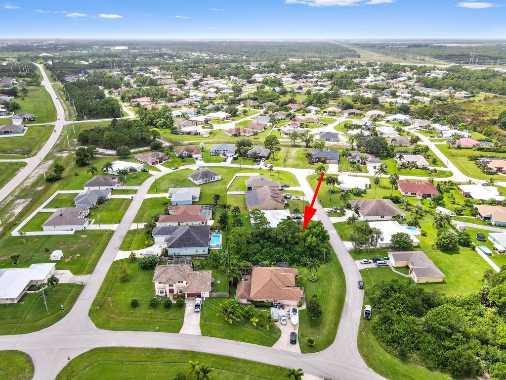 Photo of 5761 NW Cone Street, Port Saint Lucie, FL 34986 (MLS # R11019419)