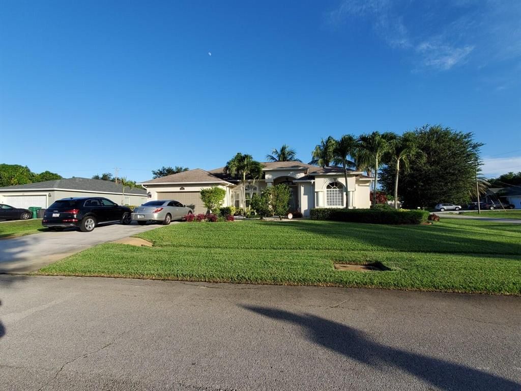 Photo of 498 SW Lawler Avenue, Port Saint Lucie, FL 34953 (MLS # R10732480)