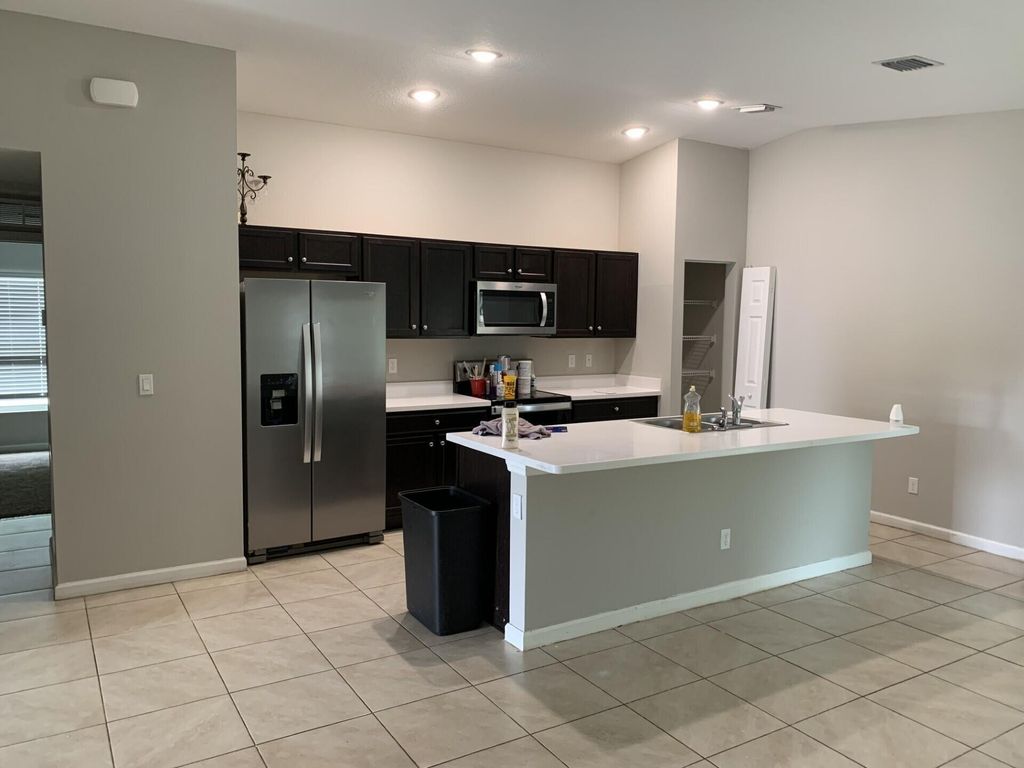 Photo of 872 SE Chaloupe Avenue, Port Saint Lucie, FL 34983 (MLS # R11074992)