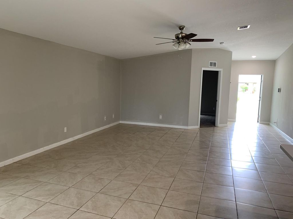 Photo of 872 SE Chaloupe Avenue, Port Saint Lucie, FL 34983 (MLS # R11074992)