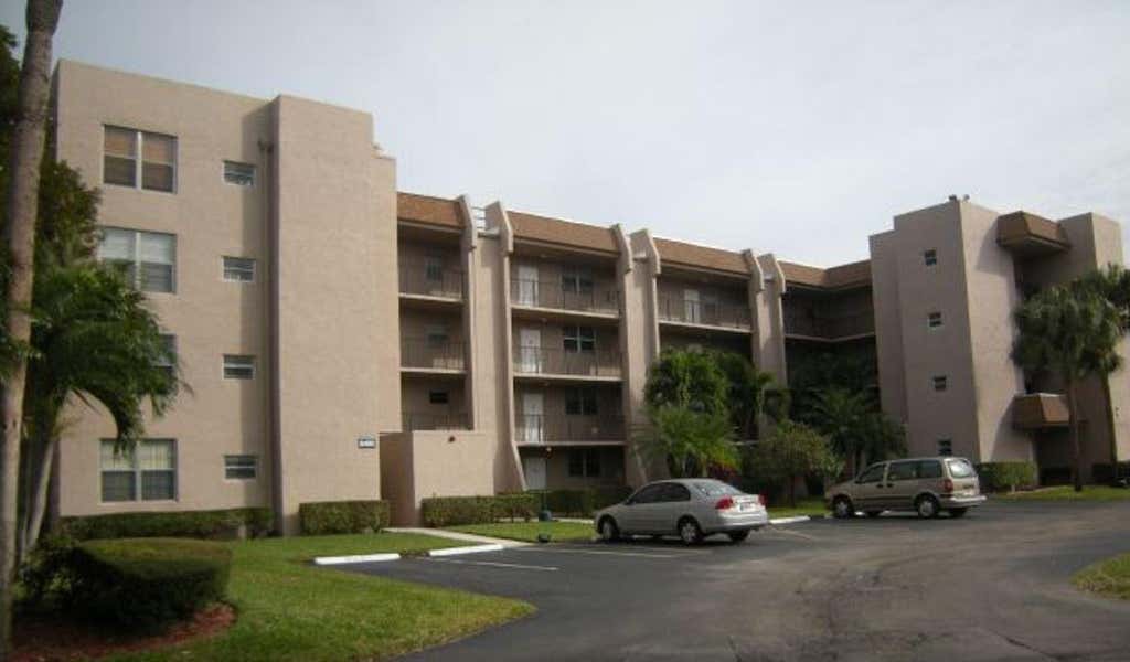 Photo of 9460 Tangerine Place #207, Davie, FL 33324 (MLS # B26063238)