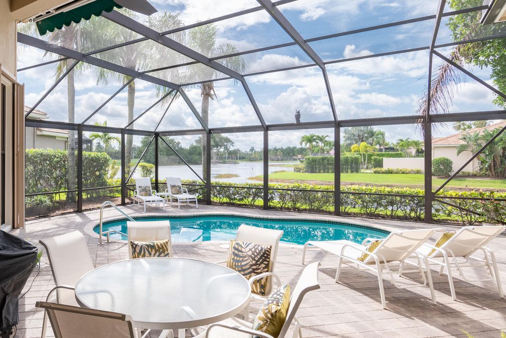 Photo of 10240 Blue Heron Cove, West Palm Beach, FL 33412 (MLS # B26012186)