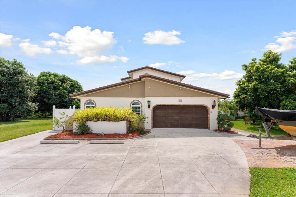 Photo of 1111 Cherlynn Terrace, West Palm Beach, FL 33406 (MLS # B26041415)