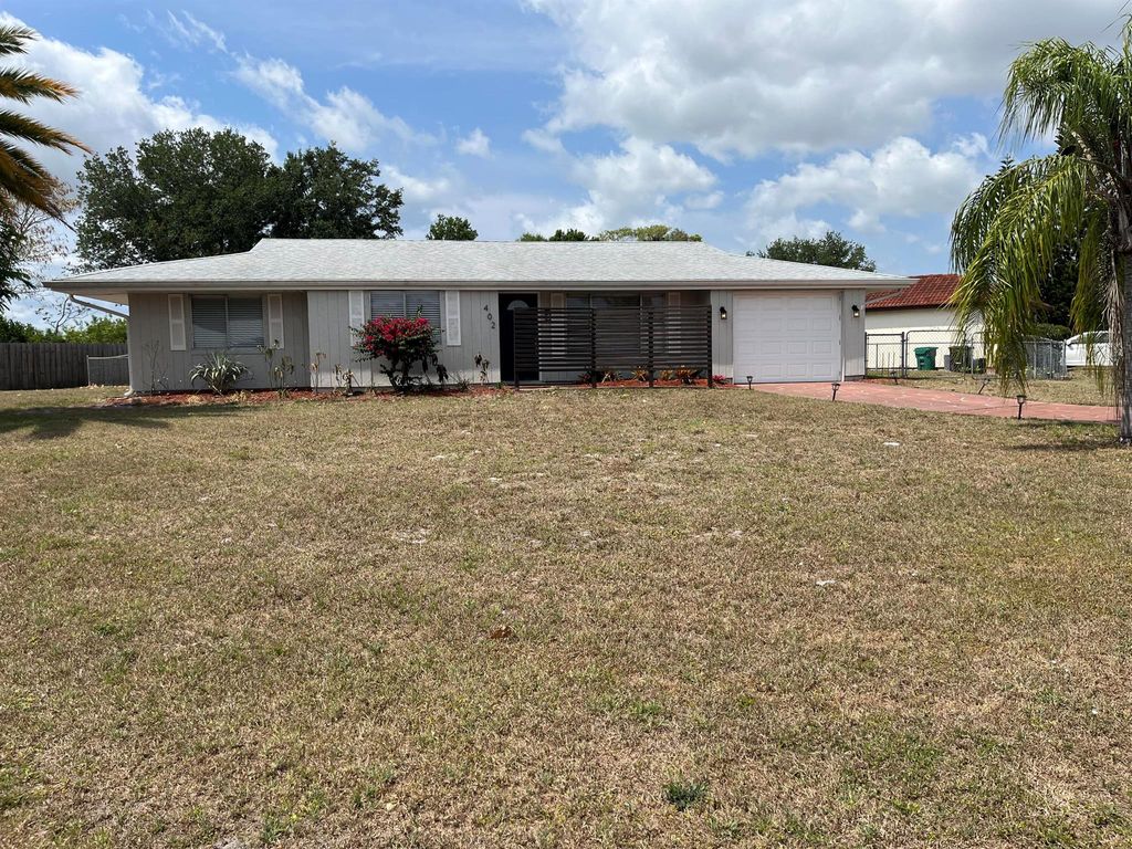 Photo of 402 SW College Park Road, Port Saint Lucie, FL 34953 (MLS # R10986782)