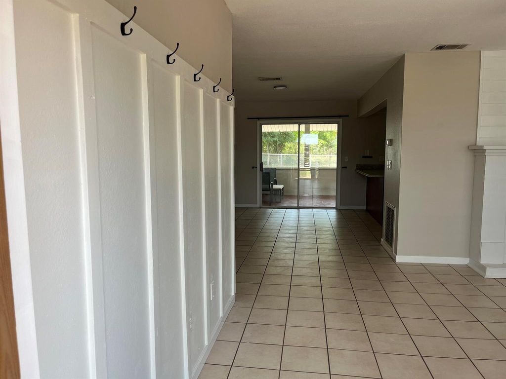 Photo of 402 SW College Park Road, Port Saint Lucie, FL 34953 (MLS # R10986782)