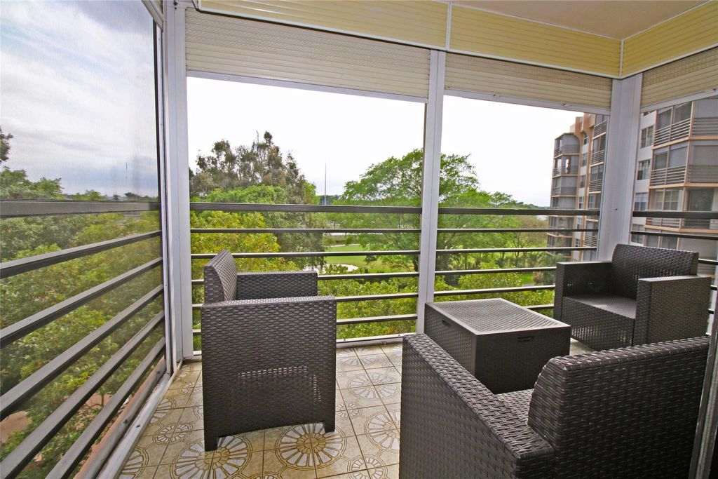 Photo of 1100 Saint Charles Place #521, Pembroke Pines, FL 33026 (MLS # F10488207)