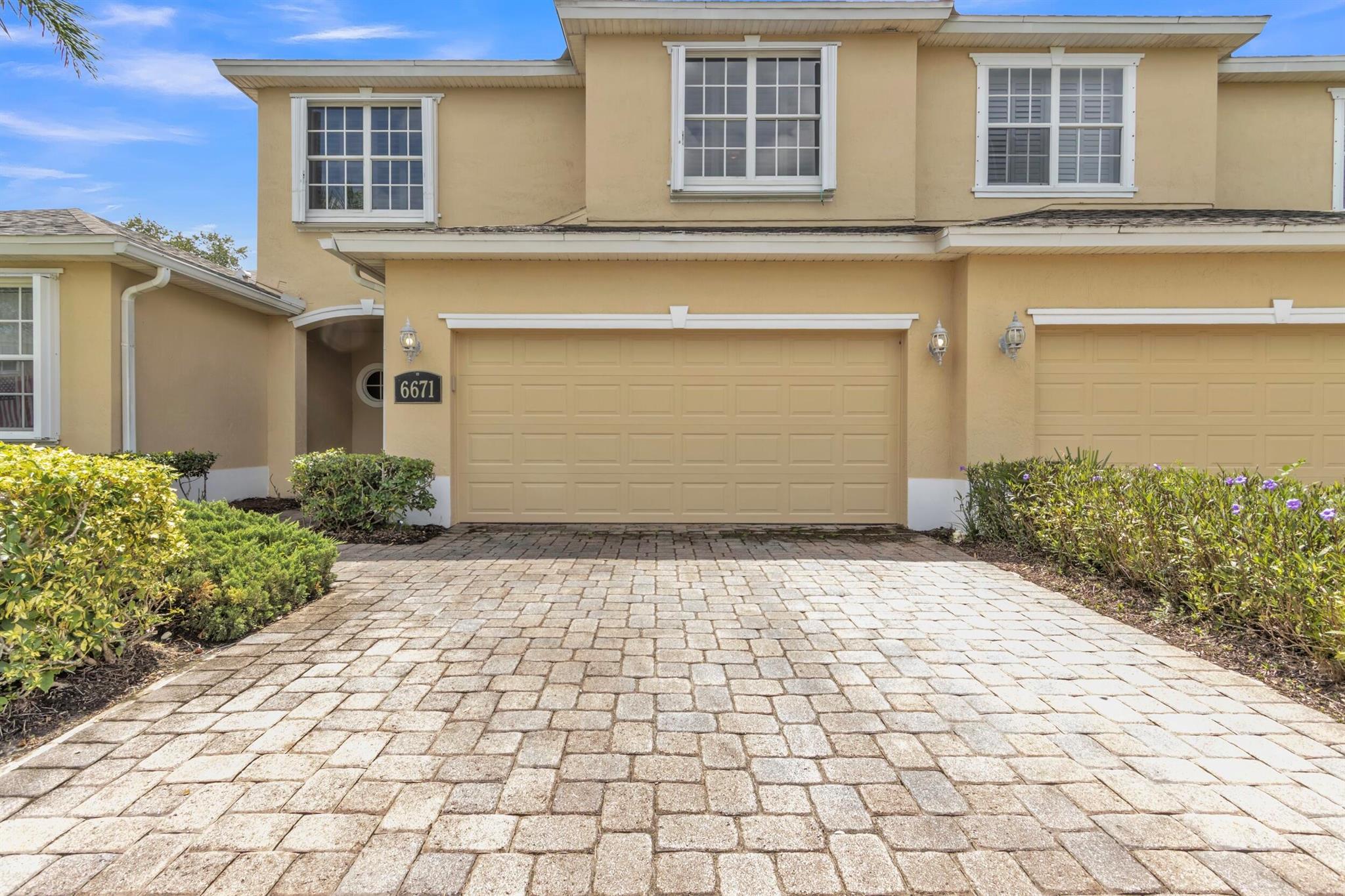 Welcome to effortless living in this spacious townhouse located within a desirable gated community in Vero Beach. Offering over 1,800 square feet, this three-bedroom, two-and-a-half-bath residence is designed for both comfort and convenience. The primary suite is thoughtfully situated on the main floor, complemented by abundant closet space throughout the home. Accordion hurricane shutters provide peace of mind, while a 2021 water heater adds modern efficiency. A screened-in patio extends your living space outdoors, perfect for enjoying Florida evenings in privacy and comfort.