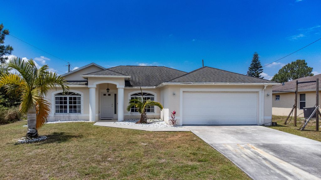 Photo of 2014 SW Trenton Lane, Port Saint Lucie, FL 34984 (MLS # R10805672)