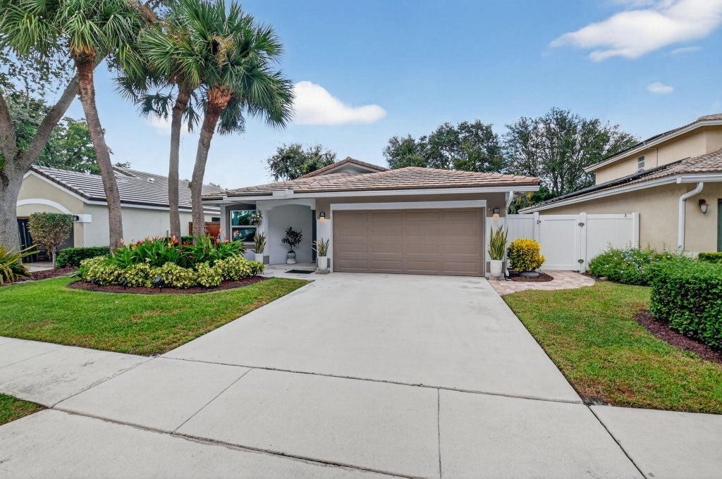 Photo of 4055 NW 1st Street, Delray Beach, FL 33445 (MLS # R11135689)