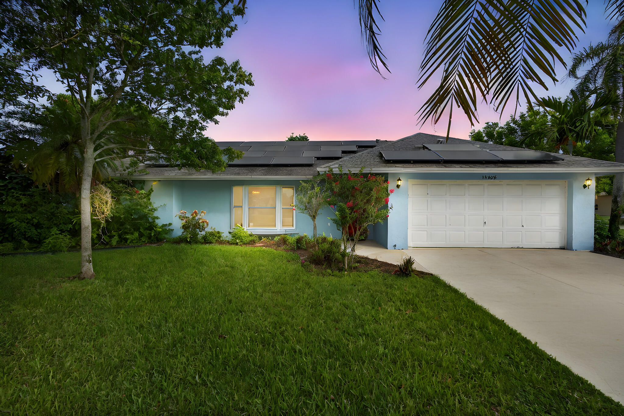 Welcome to this beautifully updated 3-bedroom, 2-bath corner-lot home in Sugar Pond Manor, offering the perfect blend of style, comfort, and functionality--all with no HOA restrictions. Step inside and be impressed by the expansive split floor plan, ideal for both entertaining and privacy. The home showcases continuous wood-look porcelain tile flooring throughout, creating a warm, modern aesthetic. The designer kitchen features quartz countertops, custom cabinetry, and recently updated stainless steel appliances--a dream for any home chef. Both bathrooms have been fully remodeled with high-end finishes, offering a spa-like feel with timeless design. Enjoy year-round comfort with a newer A/C and water heater, plus the long-term savings of fully owned solar panels.