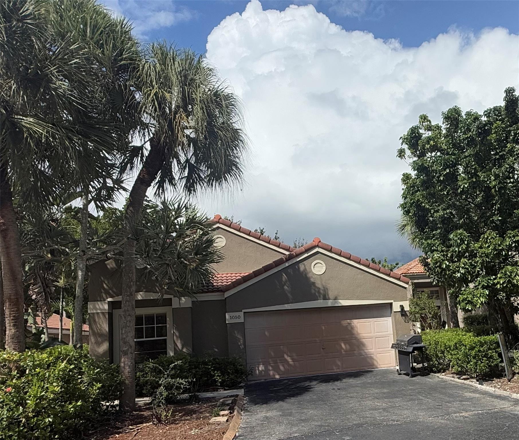 This Bright and  spacious 3-bedroom, 2-bathroom single family home with screen in patio, lake view, 2 car garage, update kitchen W/ Granite counter. Located at  the desirable Bridgewater community in Plantation. 3 minutes walking distance to Deicke park which is within the community. Tile flooring throughout, vaulted ceilings. AC-2025, The community amenities including : a pool, playground, and maintenance fees  cover lawn care and  cable, WIFI services. this location is conveniently near Airport shopping and restaurants, with easy access to major HIGHWAY.
