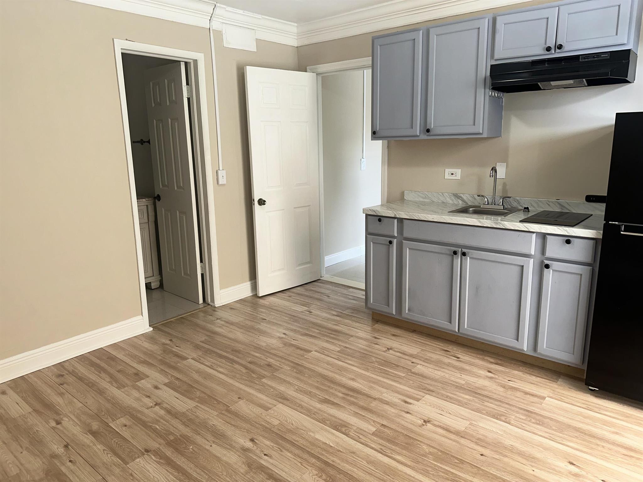 Charming 1-bedroom, 1-bathroom apartment with a private entrance, offered at a convenient $1,200 with electric and water included. This apartment is in excellent condition and features a full-size kitchen with cooktop and plenty of cabinet space. Ideally located close to schools, restaurants, shopping, supermarkets, and the beach--everything you need right at your doorstep!
