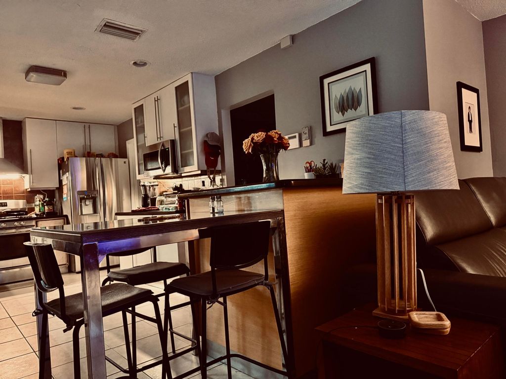 Photo of 9121 NW 13th Street, Plantation, FL 33322 (MLS # B26005476)