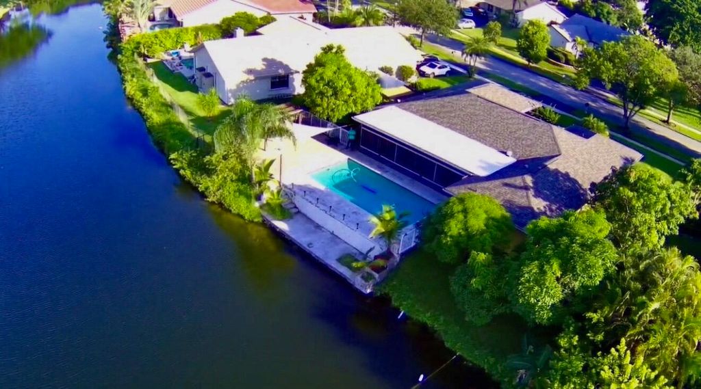 Photo of 9121 NW 13th Street, Plantation, FL 33322 (MLS # B26005476)