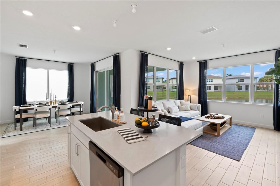 Price reflects a 15 month lease. Discover all that awaits at this brand new construction single family homes. This state of the art modern home with pond views offers gourmet kitchens with stainless steel appliances, a full-size washer and dryer, walk-in closets and impact windows with custom roller shades. Wood grain porcelain tile in main areas. Luxury tiled bathrooms with frameless shower enclosures. The community offers low move in cost and fast approvals. Throughout the community, residents can take advantage of amenities like the resort-style swimming pool, elegant clubhouse, and fully equipped fitness center. Prices subject to change daily based on community availability.