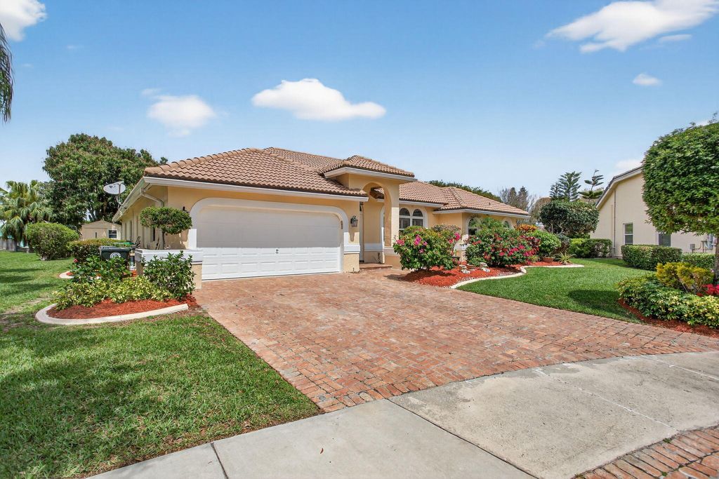 Photo of 5670 NW 38th Terrace, Coconut Creek, FL 33073 (MLS # B26009370)